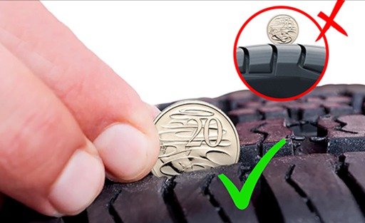 Checking tyre tread depth 